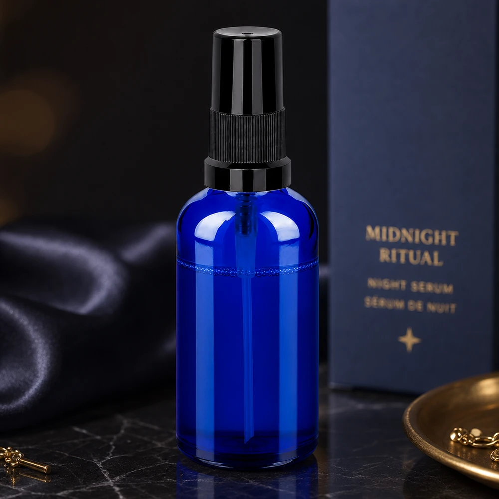 Vaporisateur 50ml noir STD BlueLine UT18/50 Vaporisateur de 50 ml avec verre bleu protégeant de la lumière et embout de pulvérisation noir durable