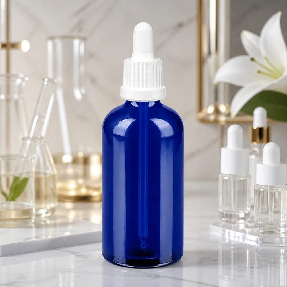 Flacon à pipette 100ml blanc OV BlueLine UT18/100 Flacon en verre bleu polyvalent 100ml avec pipette pour sérums teintures et préparations liquides