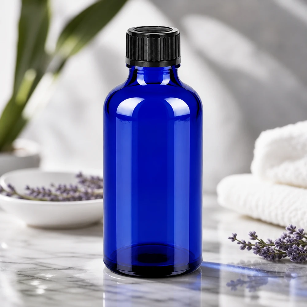 Flacon 50ml 11mm SV noir OV BlueLine UT18/50 Bouteille en verre pratique de 50 ml d'un bleu cobalt élégant avec un filetage pratique de 11 mm.