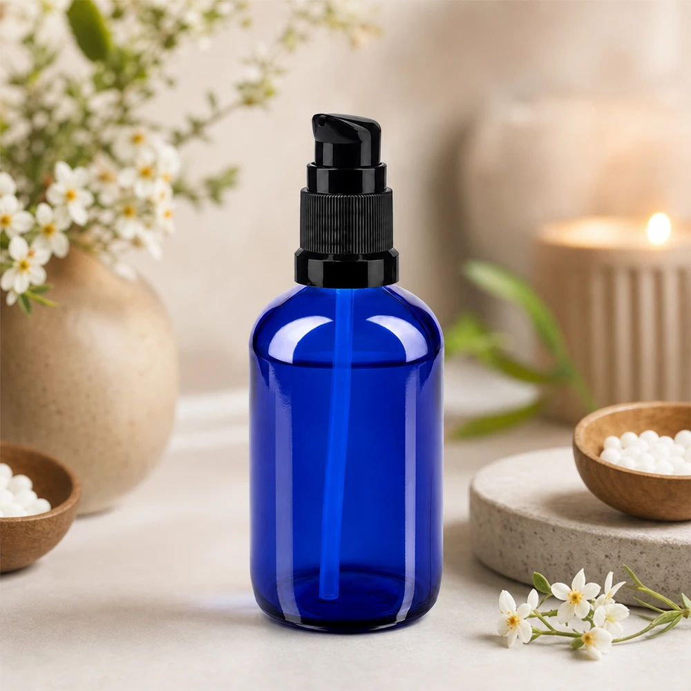 Flacon de pharmacie bleu 100ml bouchon pompe noir Std Flacon en verre opacifiante de 100 ml, bleu, avec bouchon-pompe, idéal pour les principes actifs sensibles