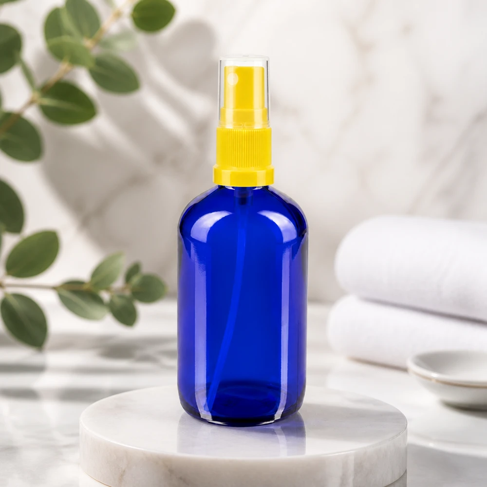 Flacon en verre bleu STD de 100 ml avec vaporisateur jaune, pour huiles essentielles et hydrolats