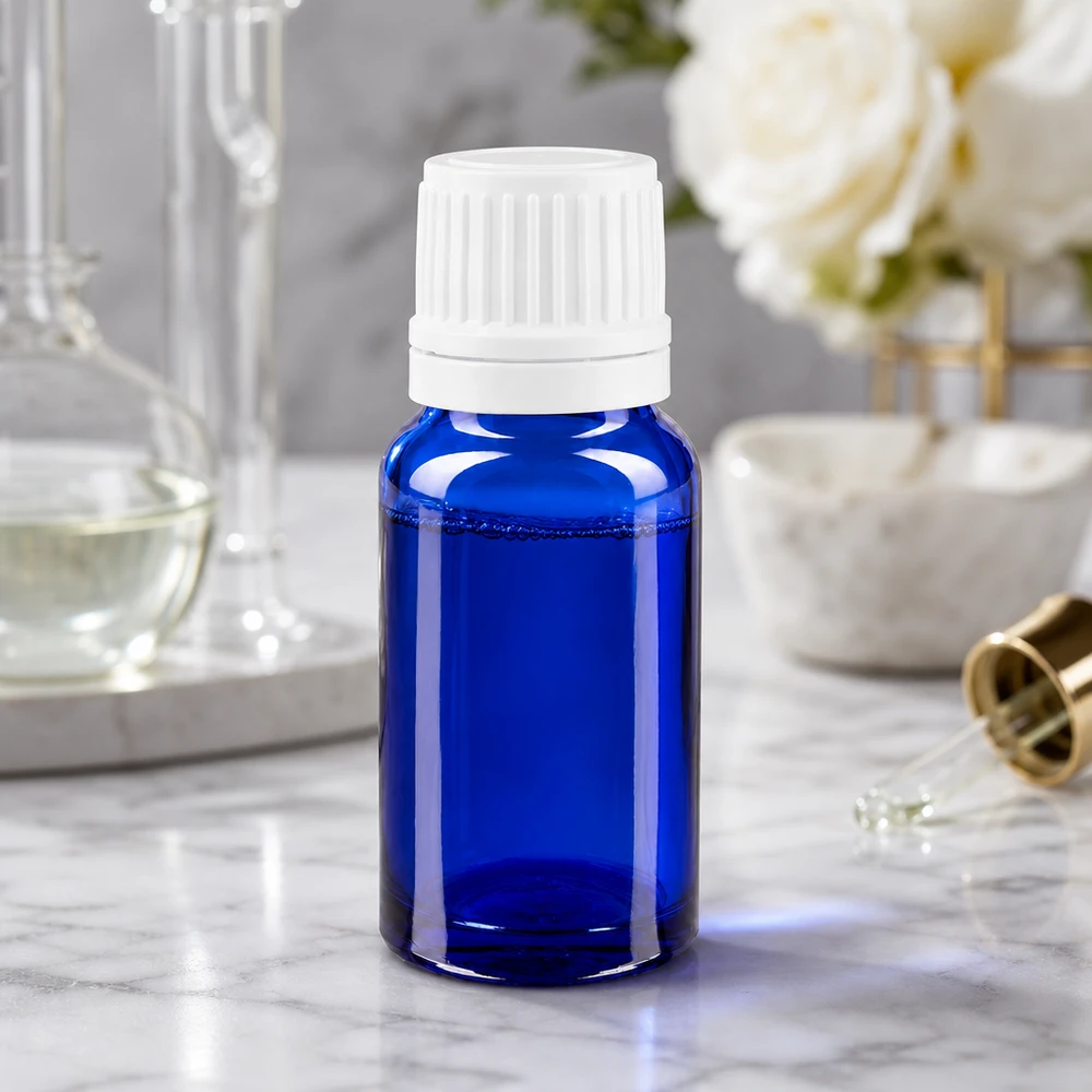Flacon bleu cobalt de 10 ml muni d'un bouchon OV à sécurité enfants pour huiles essentielles
