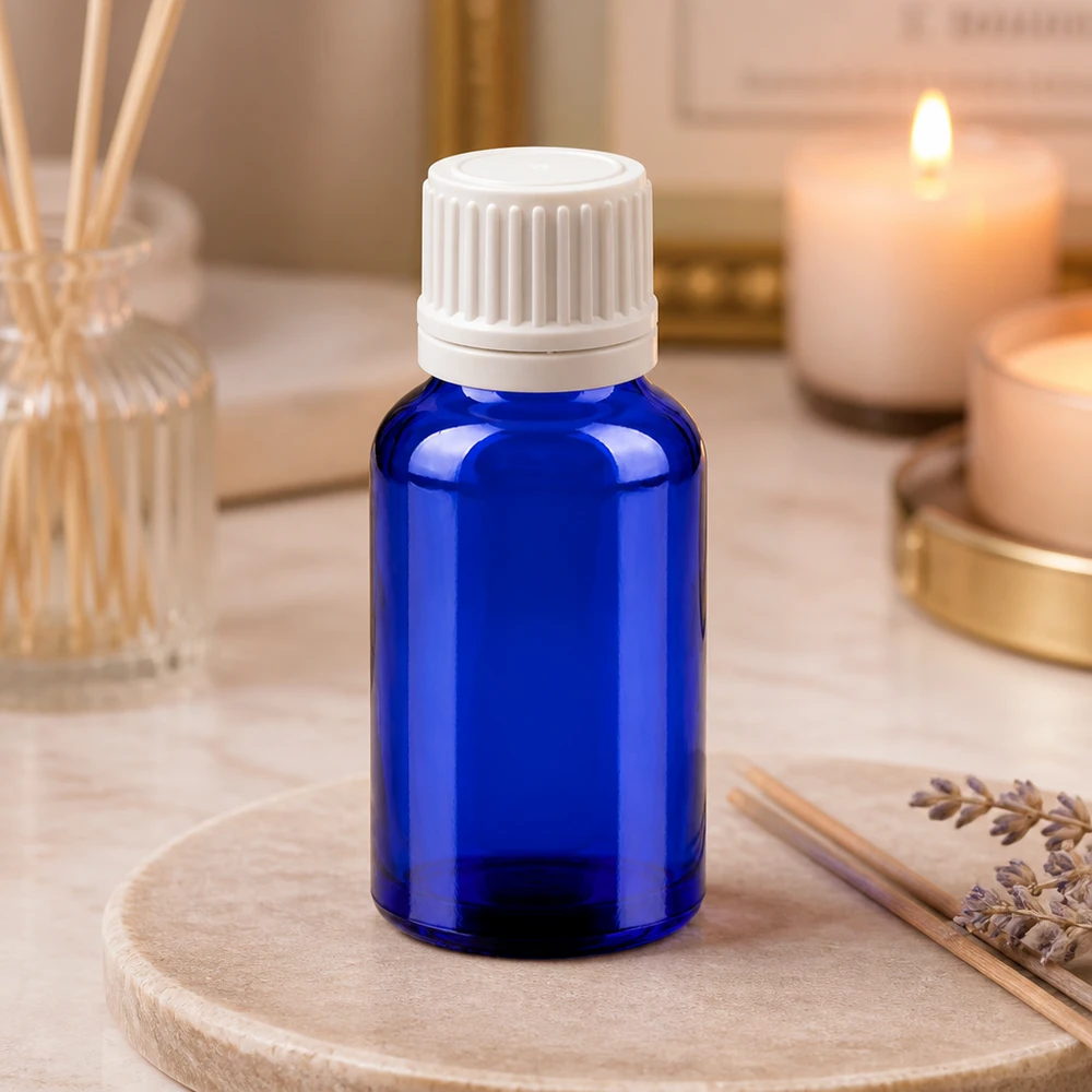 Flacon compte-goutte 20ml 0.7mm blanc OV BlueLine UT18/20 Flacon compte-gouttes 20ml de haute qualité en verre bleu anti-UV avec bouchon à vis blanc