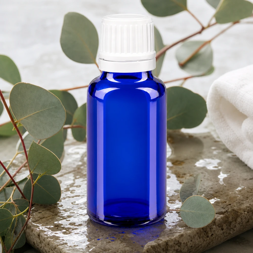 Flacon compte-gouttes médical de 20 ml, bleu cobalt, avec verre anti-UV et bouchon doseur blanc