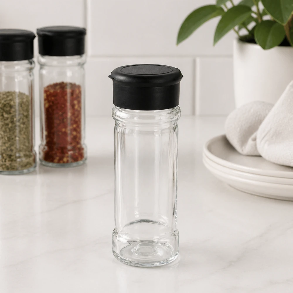 Pot à sel/épices 100 ml avec saupoudreuse, noir Pot à épices transparent avec couvercle à secouer noir, à côté de pots à épices remplis