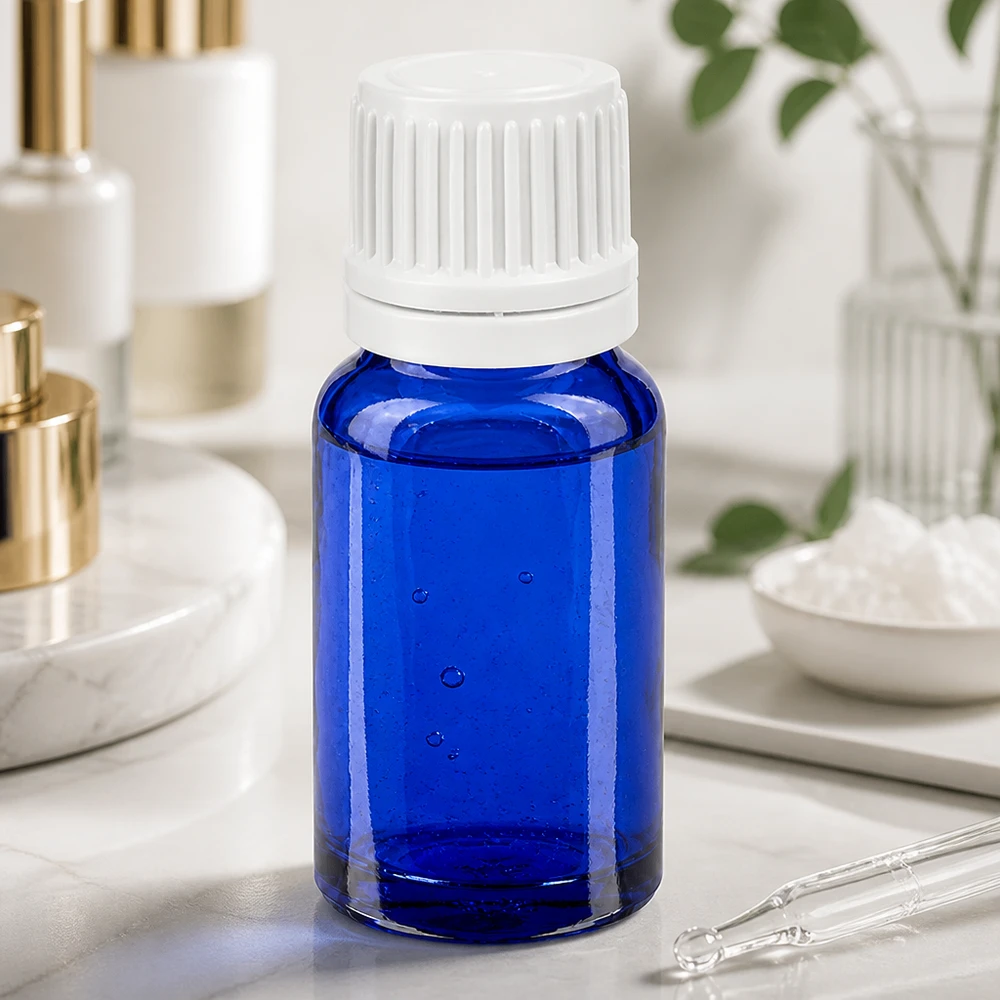 Flacon compte-goutte 10ml 0.7mm blanc OV BlueLine UT18/10 Bouteille en verre bleu avec bouchon de sécurité enfant blanc pour conserver les liquides en toute sécurité