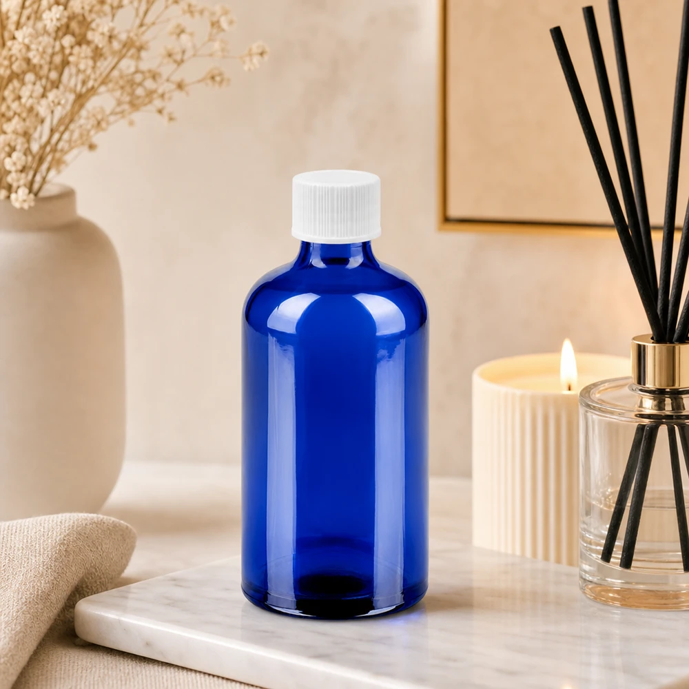 Flacon 100ml 11mm SV blanc STD BlueLine UT18/100 Bouteille en verre bleue élégante de 100 ml avec couvercle blanc parfaite pour les cosmétiques et les mélanges de bricolage