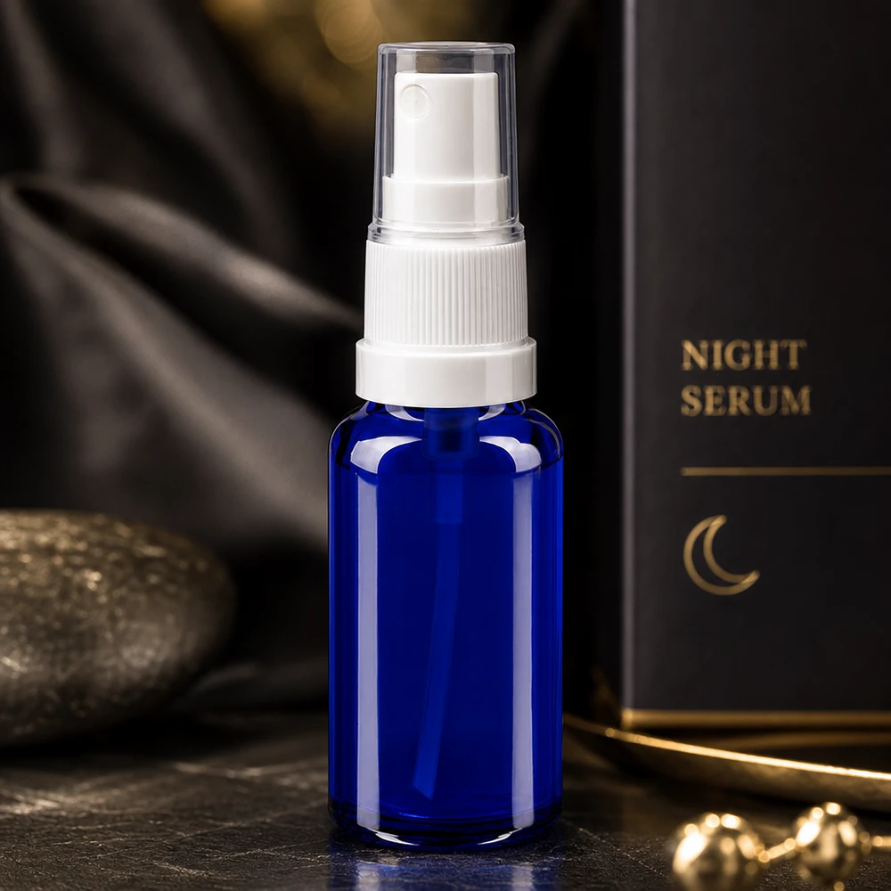 Flacon pulvérisateur de pharmacie bleu cobalt de 20 ml, muni d'une pompe blanche et d'un bouchon transparent