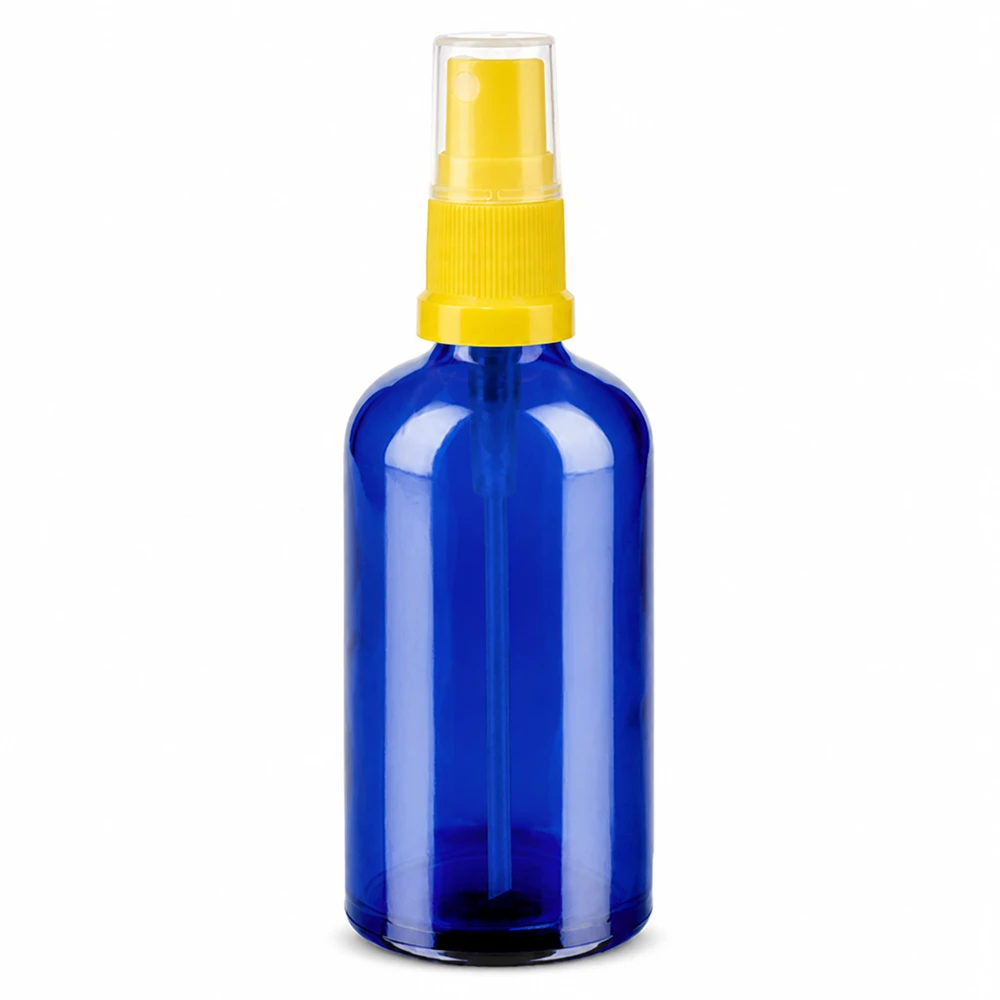 Flacon en verre bleu de 100 ml avec tête de pulvérisation jaune pour la cosmétique et l'aromathérapie