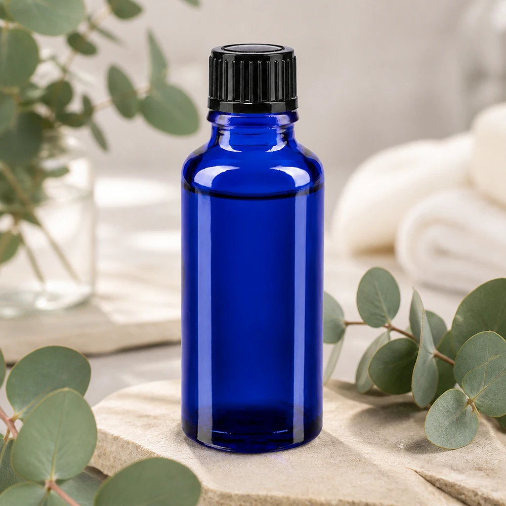 Flacon de pharmacie cylindrique bleu de 30 ml avec bouchon à vis rainuré pour huiles essentielles