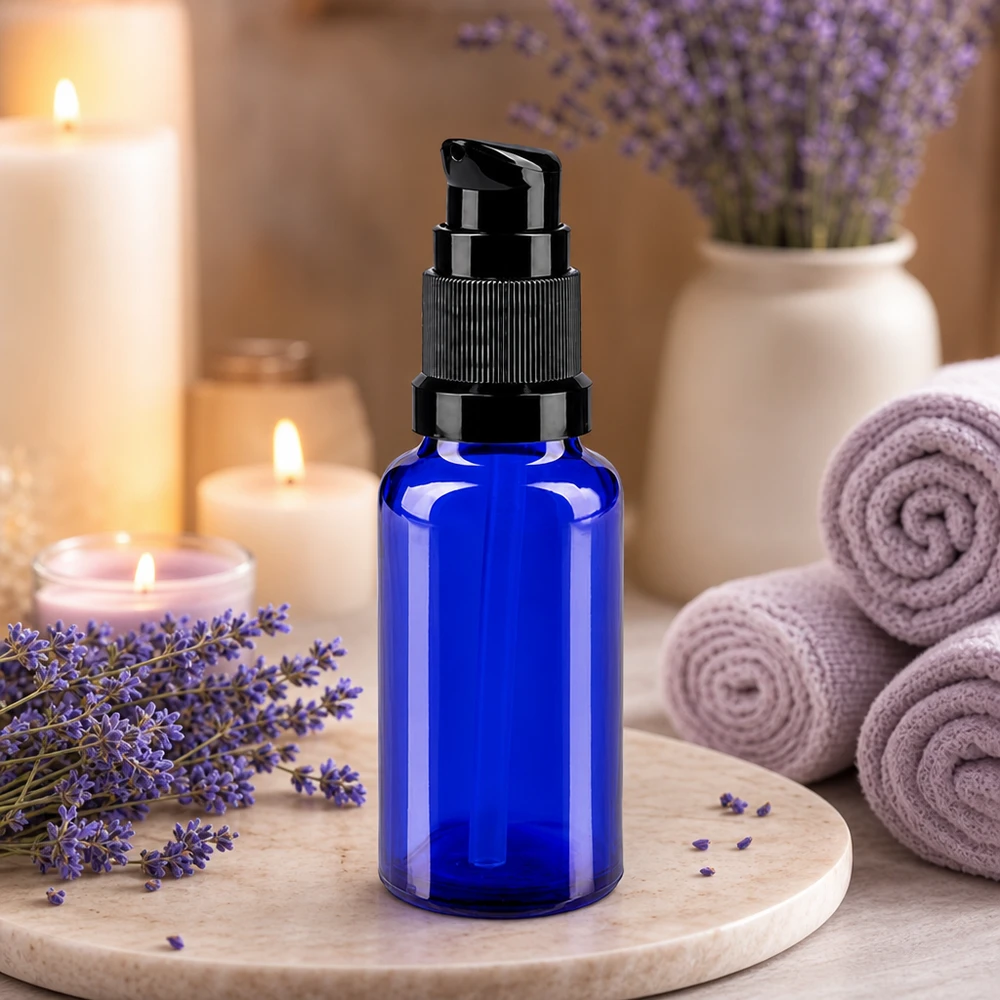 Flacon en verre bleu cobalt de 20 ml avec pompe standard noire, idéal pour les huiles essentielles