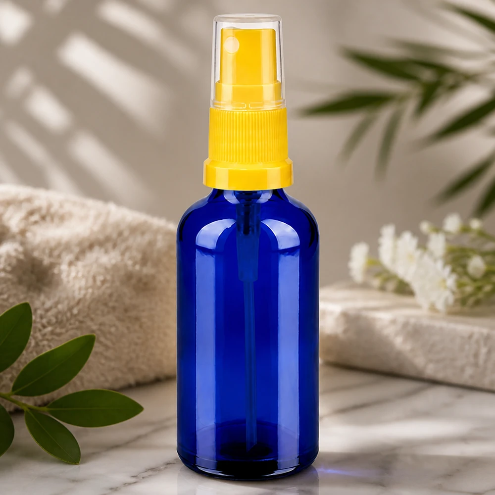 Vaporisateur 50ml jaune/tr. STD BlueLine UT18/50 Vaporisateur réutilisable de 50 ml en verre au cobalt robuste pour un emballage cosmétique durable