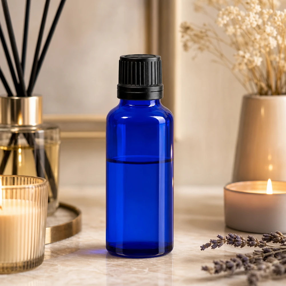 Petit flacon en verre d'apothicaire bleu de 30 ml avec compte-gouttes précis de 1 mm pour huiles essentielles